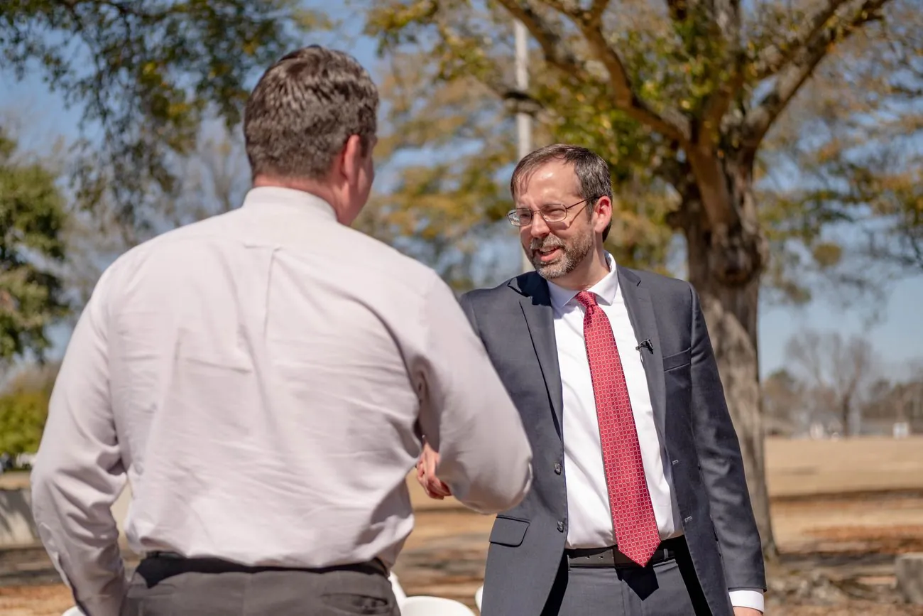Shane Gottwals speaking with a supporter